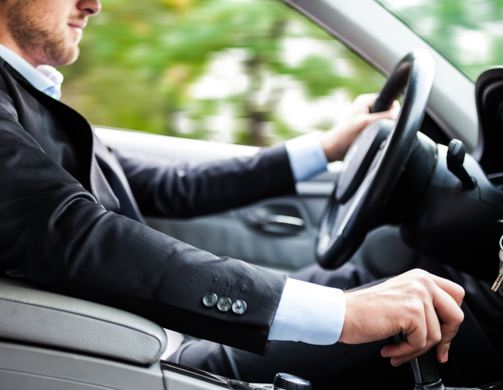 Man driving his car